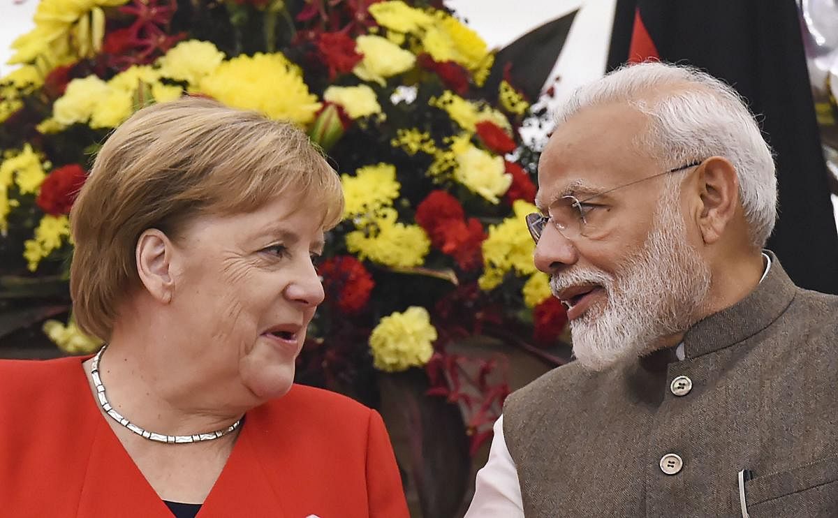 Prime Minister Narendra Modi and German chancellor Angela Merkel during their joint press conference at Hyderabad House in New Delhi, Friday, Nov. 1, 2019. (PTI Photo/Atul Yadav)
