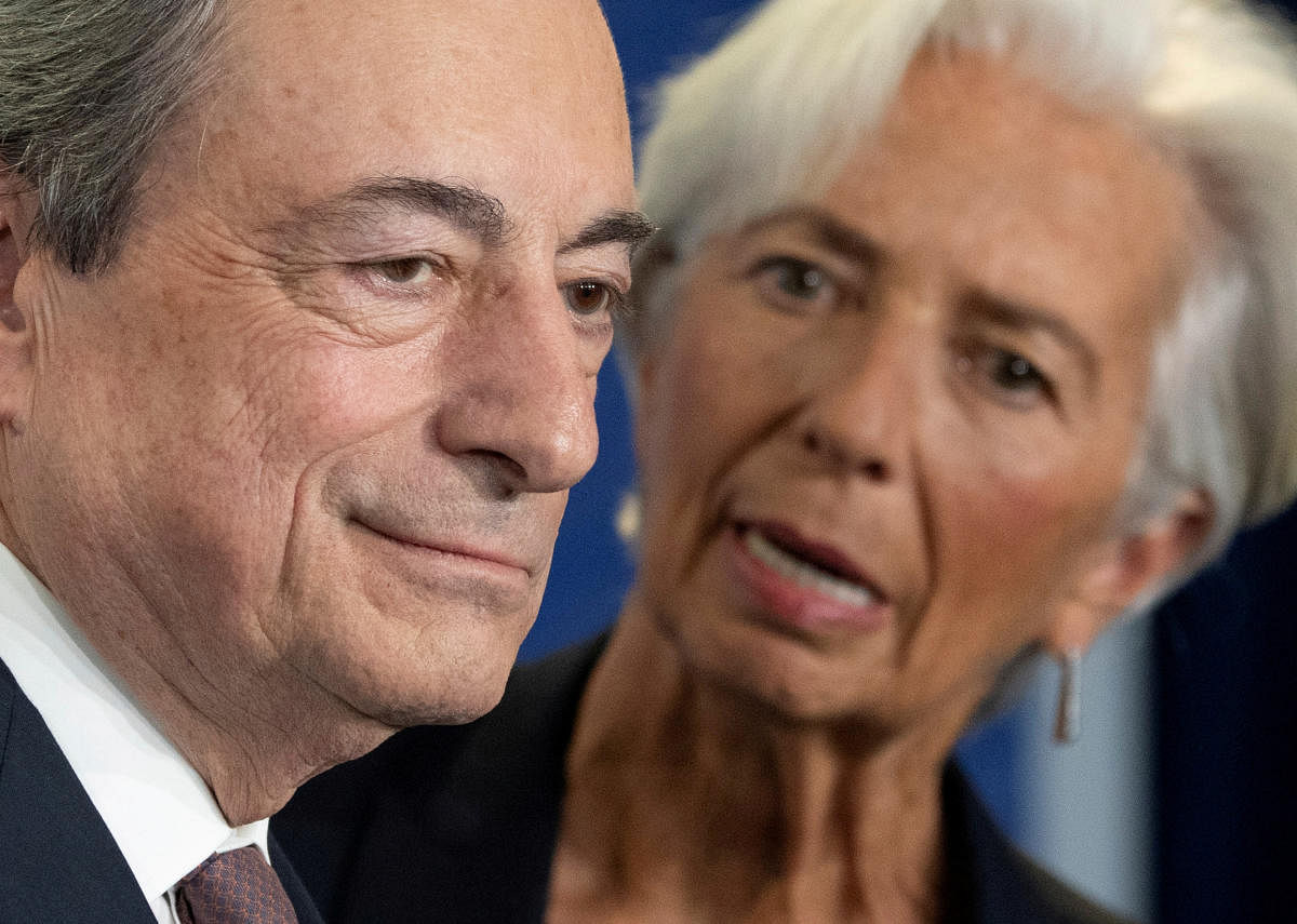Christine Lagarde, President-designate of the European Central Bank talks to ECB's outgoing President Mario Draghi in Frankfurt. Reuters photo