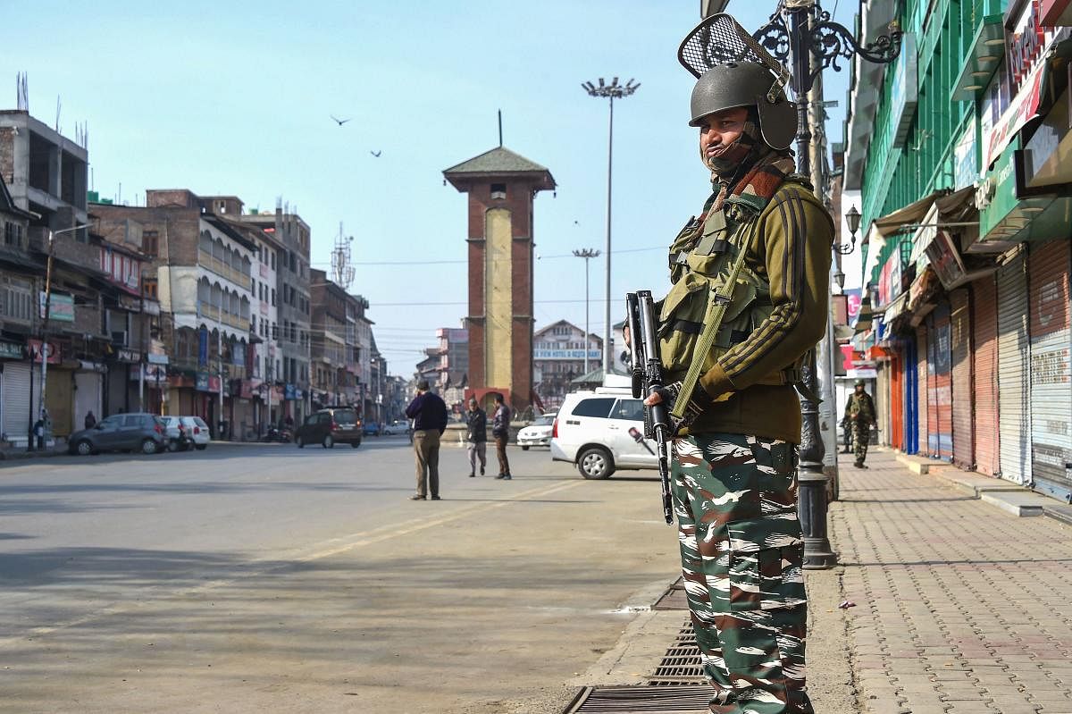 Security personnel keep vigil at Lal Chowk after bifurcation of the Jammu and Kashmir state came into existence. (PTI Photo)