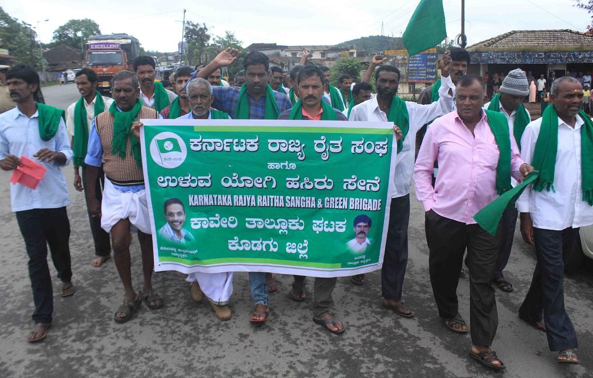 Farmer associations stage a protest against Regional Comprehensive Economic Partnership (RCEP), in Madikeri on Thursday.