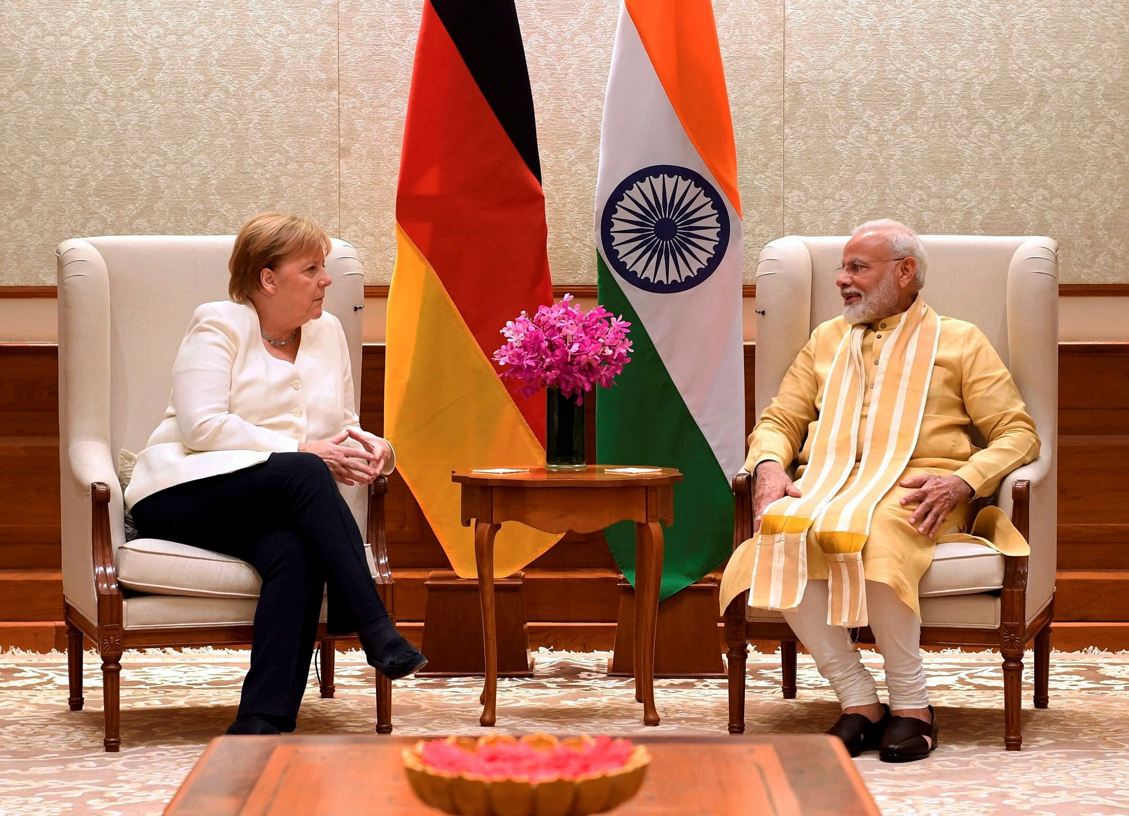 Prime Minister Narendra Modi with German Chancellor Angela Merkel at Lok Kalyan Marg in New Delhi. (PTI Photo)