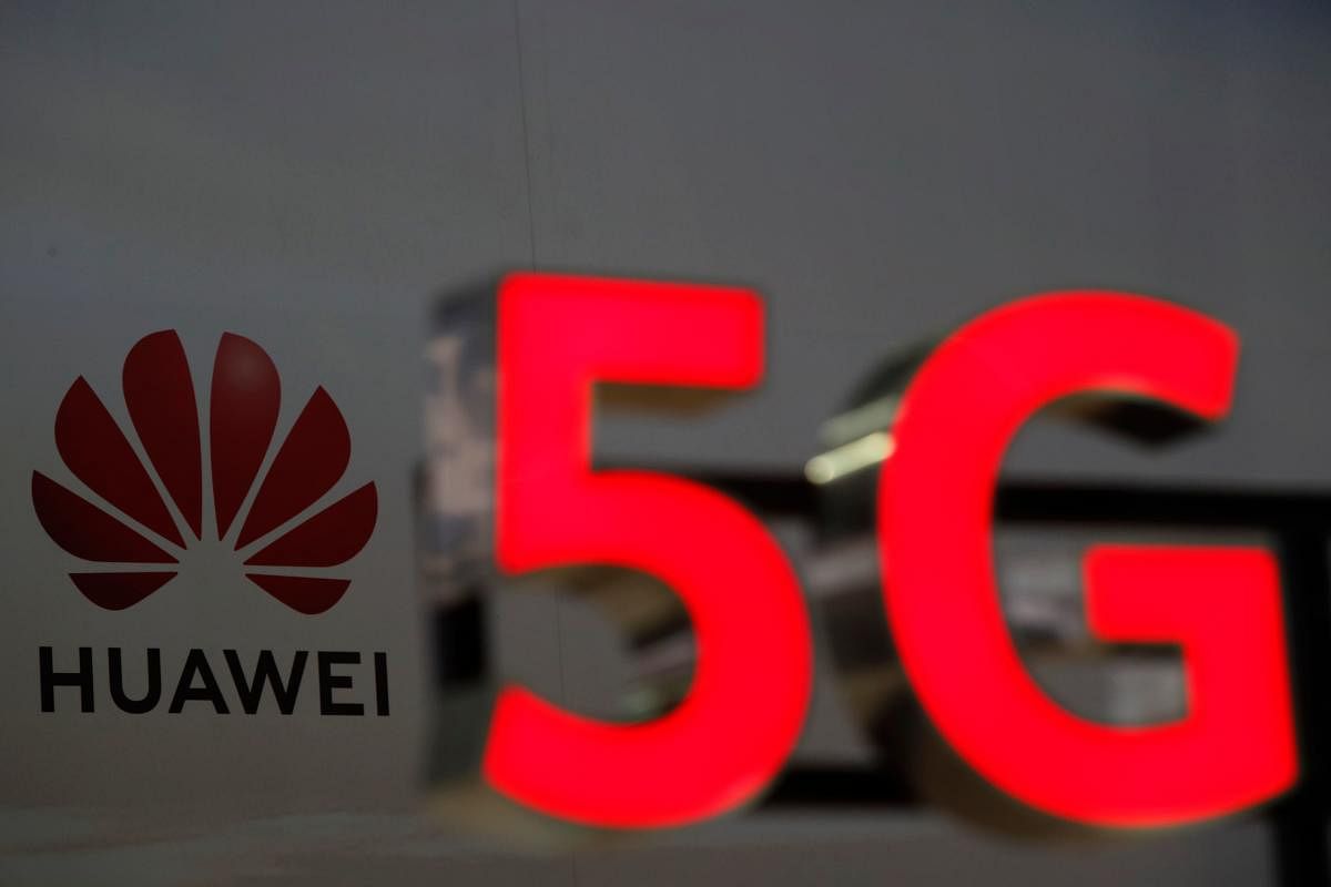 Huawei and 5G signs are on display (AFP Photo)