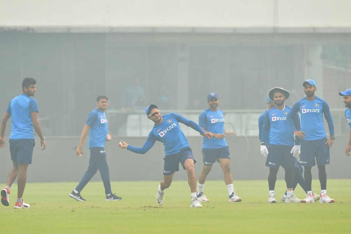 India's Manish Pandey (C) throws a ball during a practice session at Arun Jaitley Cricket Stadium in New Delhi (PTI Photo)