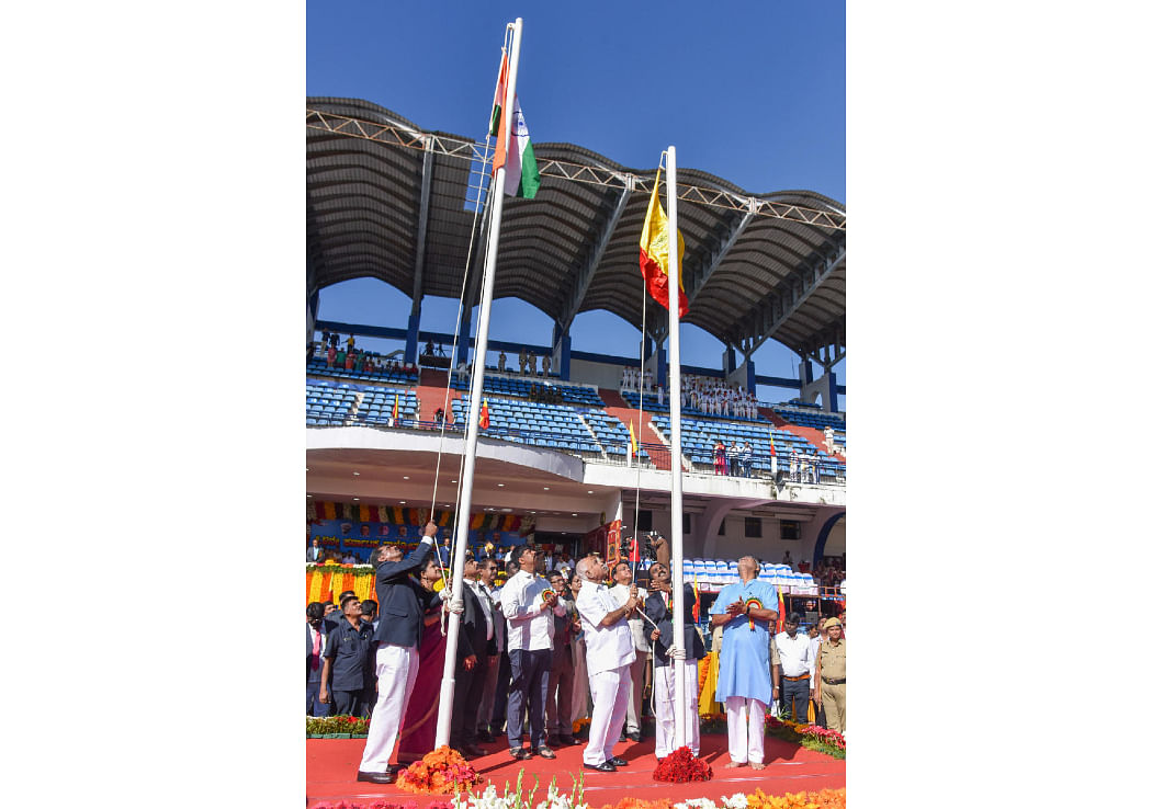 B S Yeddyurappa Chief Minister hoisting national flag and Kannada flag at Karnataka Rajyotsava and Children festival celebration organised by Public Instruction Department at Sree Kanteerava Stadium in Bengaluru on Friday. S Suresh Kumar, Primary and High