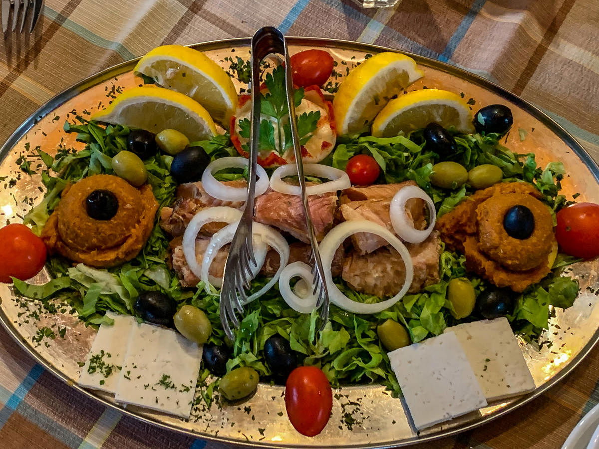 Salad accompanies a seafood platter
