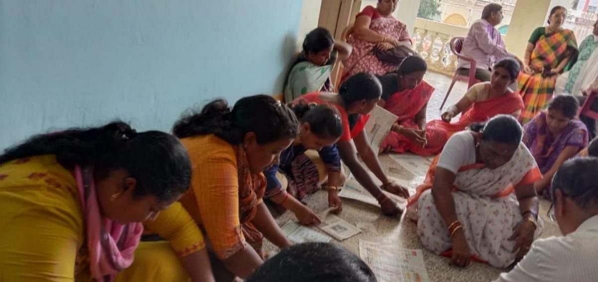 Women during a paper bag and cover-making training programme, organised by Rotary Vanivilasa Mysuru in Mysuru, recently. Photo by special arrangement