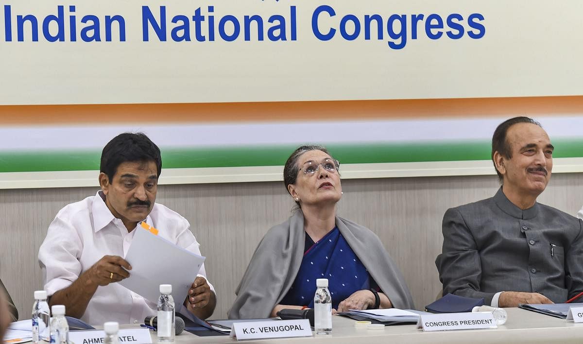  Congress President Sonia Gandhi with party leaders KC Venugopal and Ghulam Nabi Azad during a meeting with general secretaries in New Delhi, Saturday, Nov. 2, 2019. (PTI Photo)