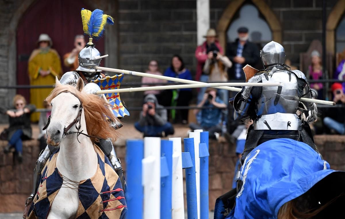 Two jousting competitors come together during the inaugural "Ashes" jousting tournament between Australia and England at the Kryal Castle in Leigh Creek, some 100 kms west of Melbourne, on November 3, 2019. - Australia and England took their storied sport