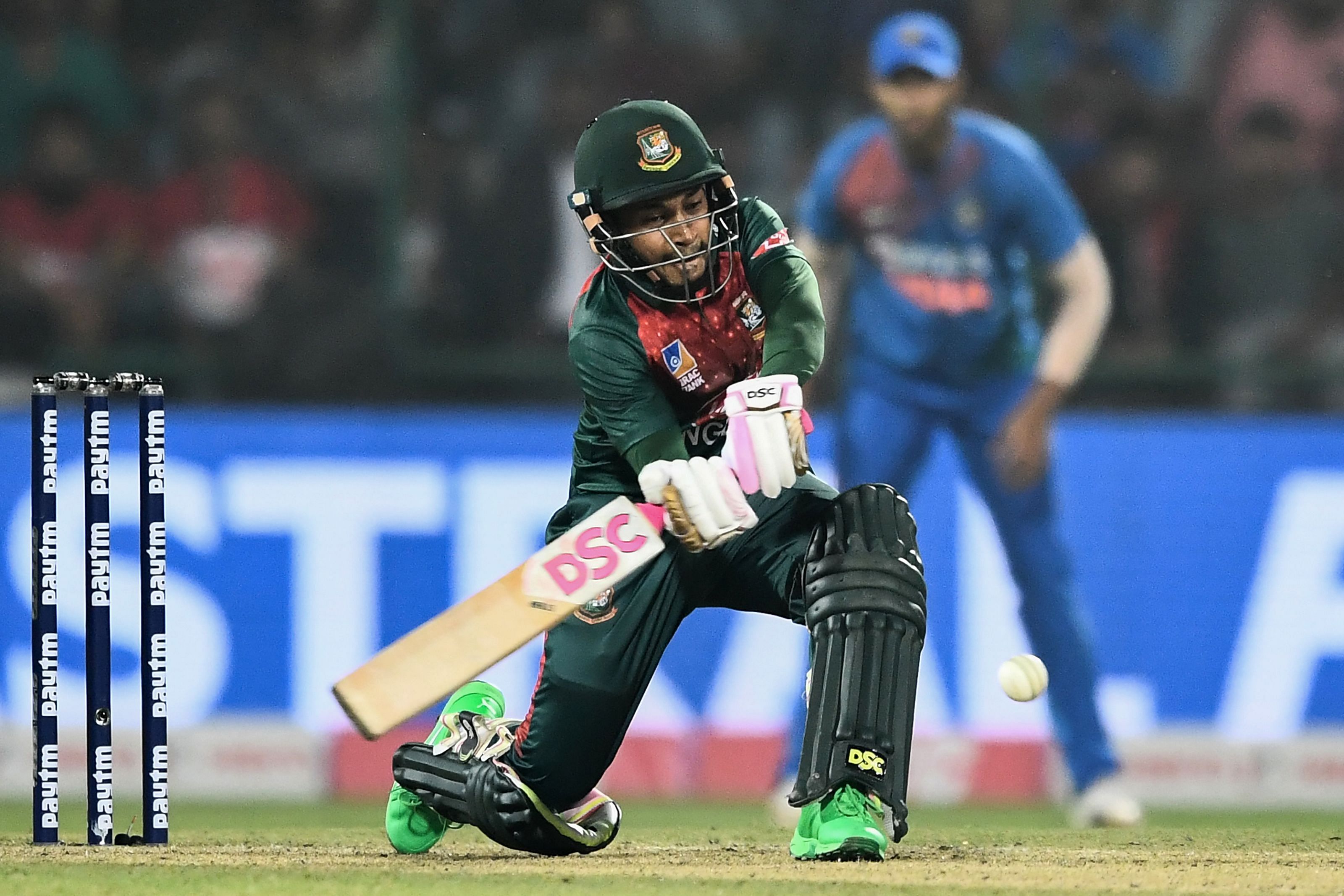 Bangladesh's Mushfiqur Rahim plays a shot during the first T20 international cricket match of a three-match series between Bangladesh and India, at Arun Jaitley Cricket Stadium in New Delhi. (AFP Photo)