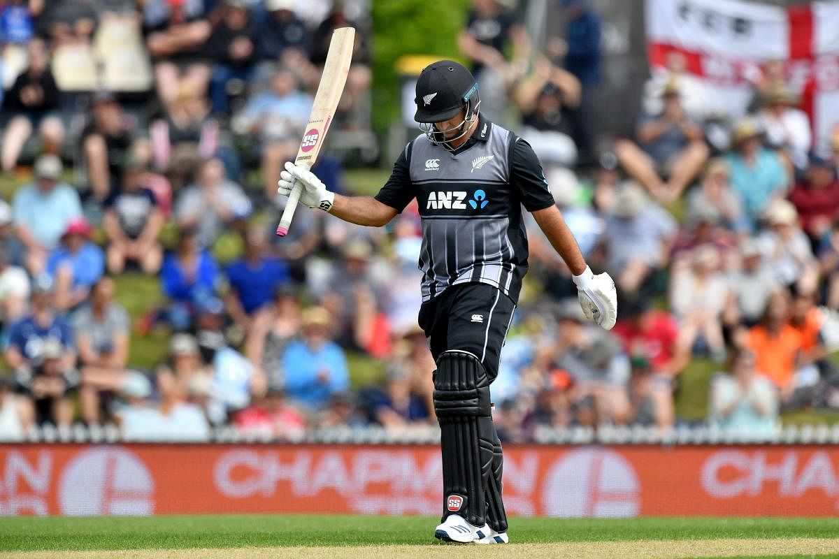 New Zealand's Colin de Grandhomme celebrates his half-century (50 runs) during the Twenty20 cricket match between New Zealand and England at Saxton Oval in Nelson on November 5, 2019. (Photo by Marty MELVILLE / AFP)
