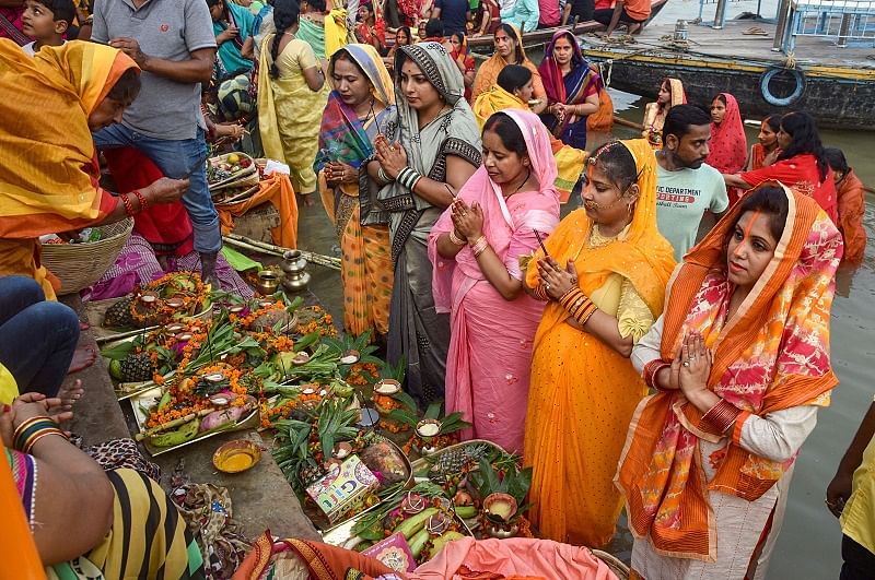 The priest of the temple Harish Mishra said that the devotees suggested that the gods should also wear masks as they might also be affected by pollution. (PTI Photo)