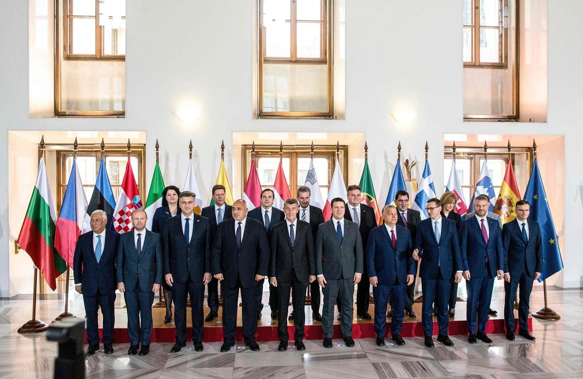 Leaders of various countries pose for a group photo at the start of the EU Cohesion summit, attended by southern and central European representatives of 16 EU member states on November 5, 2019 in Prague. (AFP)
