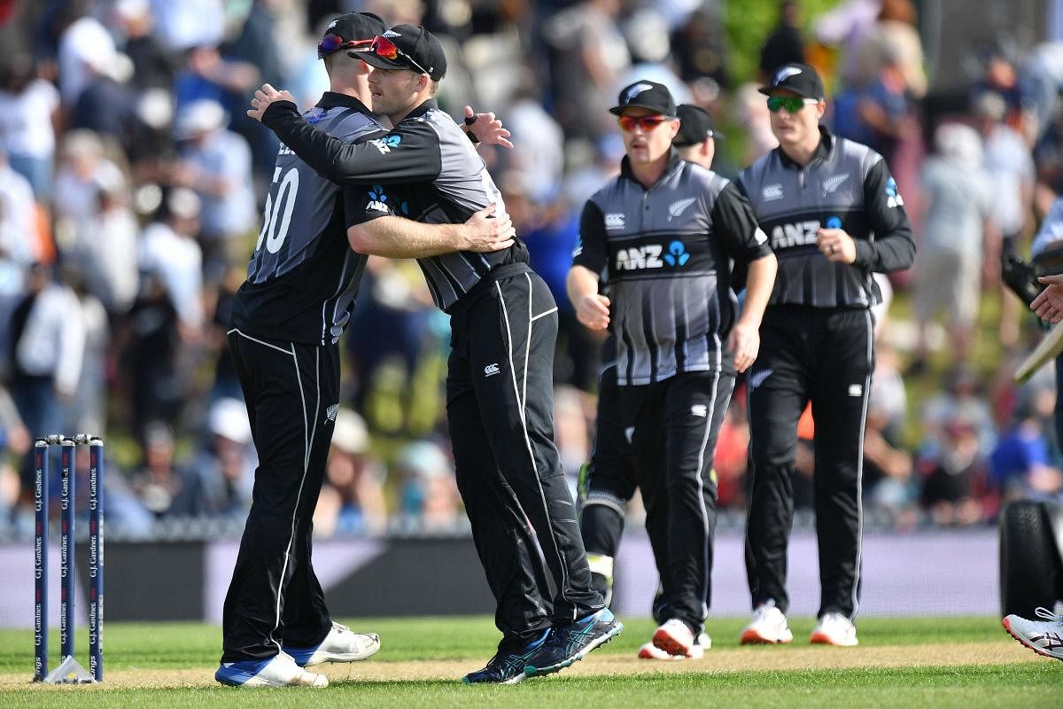 New Zealand's players celebrate their victory during the Twenty20 cricket match between New Zealand and England at Saxton Oval in Nelson on November 5, 2019. (Photo by Marty MELVILLE / AFP)