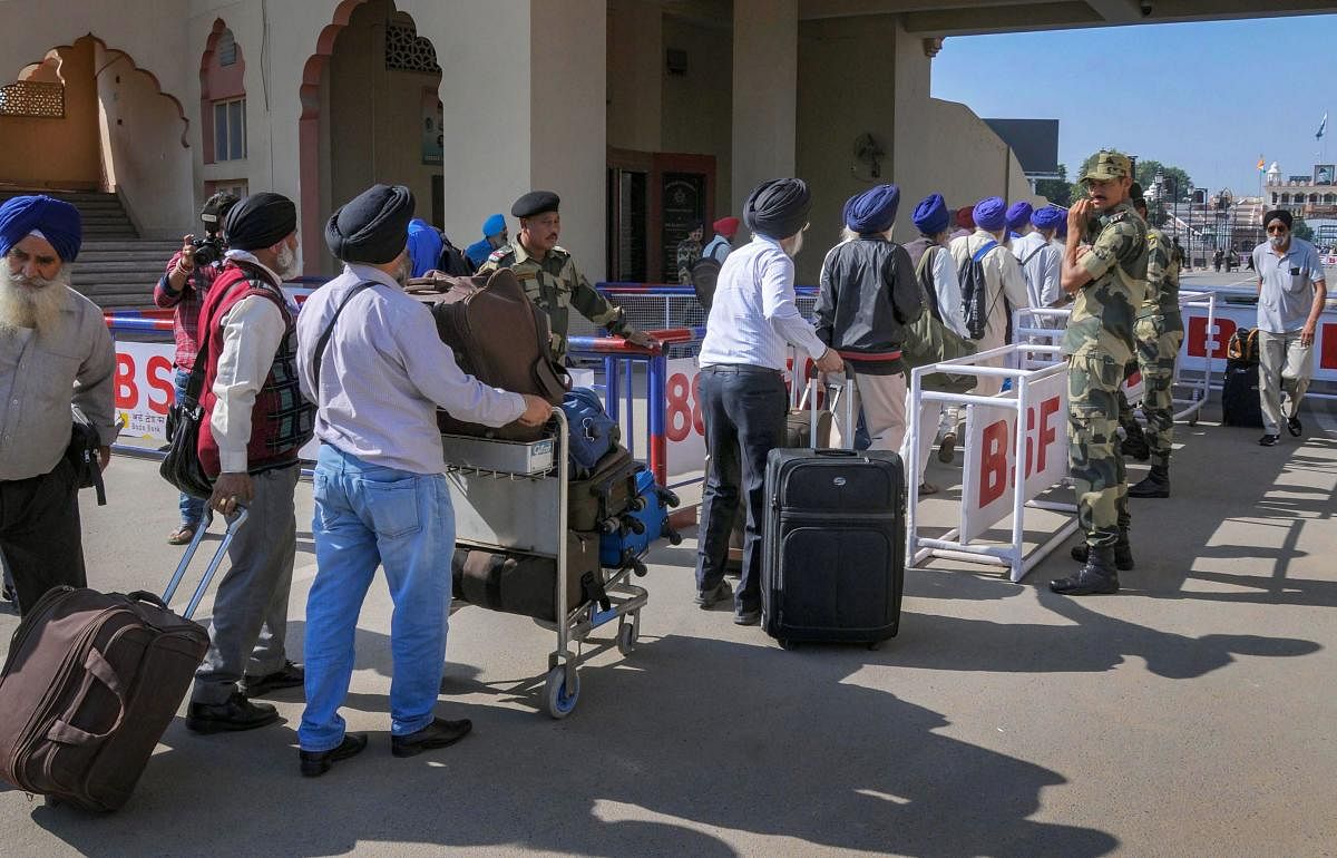 Sikh devotees leave for Pakistan via Attari-Wagah border to celebrate the 550th birth anniversary of Guru Nanak Dev ji at Gurdwara Darbar Sahib Kartarpur. (PTI Photo)
