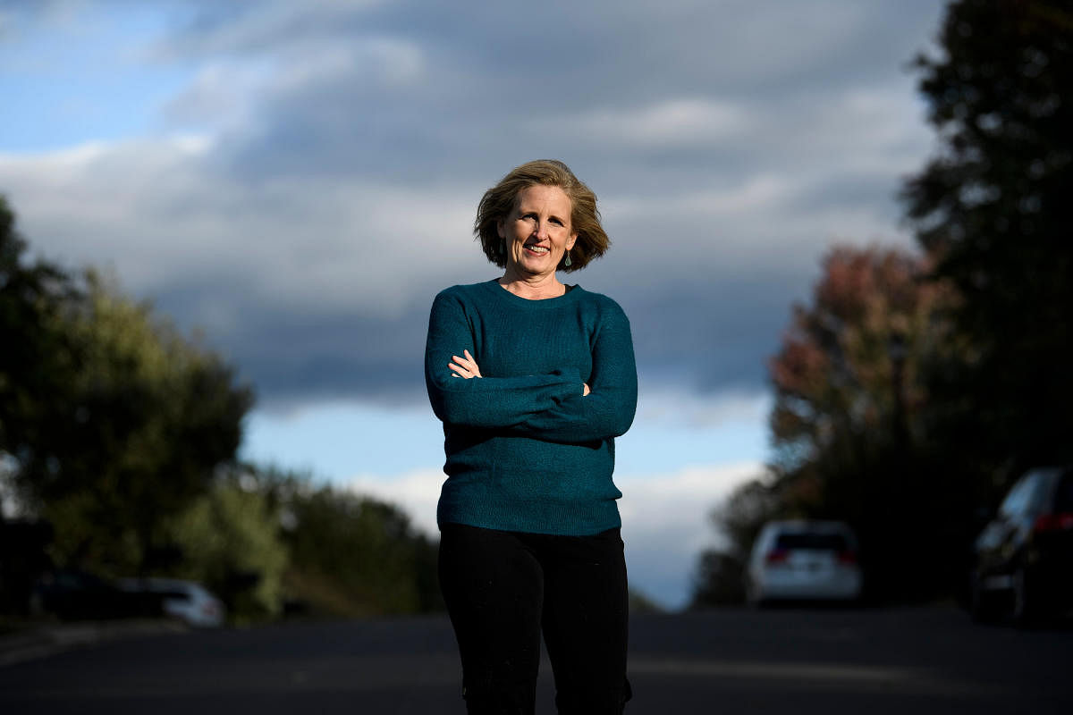 Juli Briskman, whose one-handed salute was immortalised in an AFP photograph, beat the Republican incumbent to a seat on the Loudoun County Board of Supervisors, in state elections that saw Trump's party suffer a series of stringing defeats. (AFP File Pho