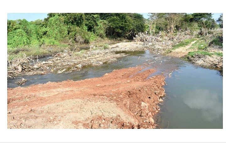 The villagers explained that huge quantities of sand have been accumulated in the river and on the surrounding lands due to heavy rains that lashed the region recently. (DH photo)
