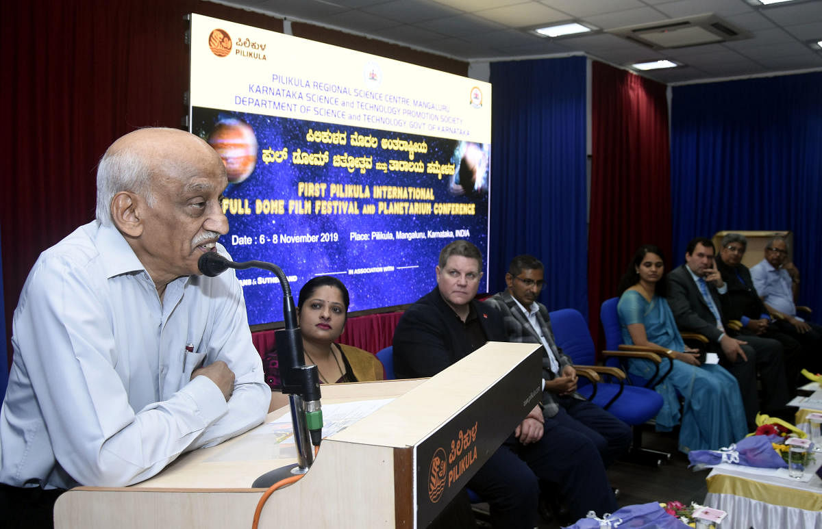 ISRO former Chairman A S Kiran Kumar speaks at the inaugural function of the first Pilikula International Full-Dome Film Festival and Planetarium Conference at Pilikula Regional Science Centre in Mangaluru on Wednesday. dh photo