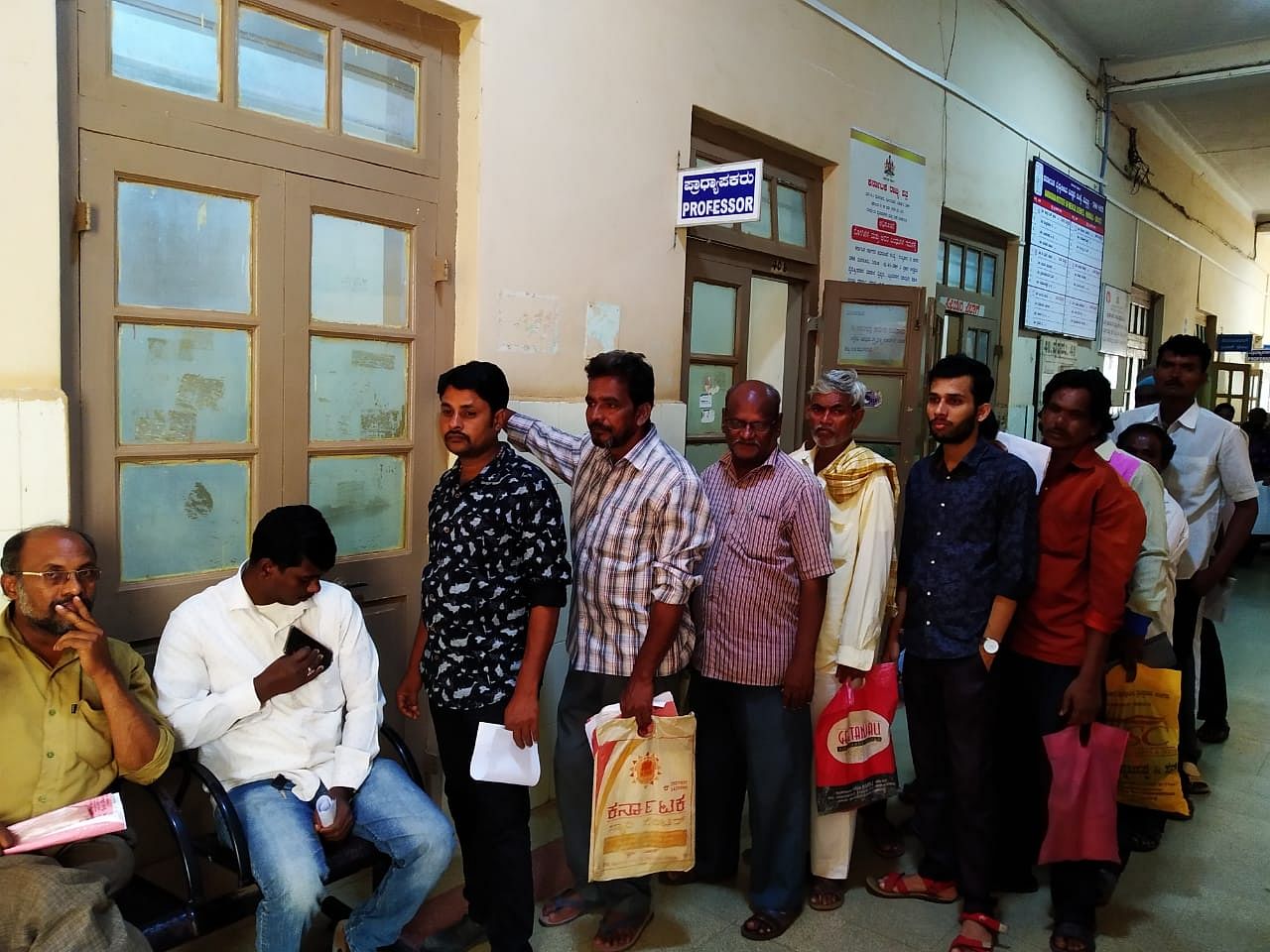 Long queue of patients at KIMS OPD section in Hubballi on Friday.