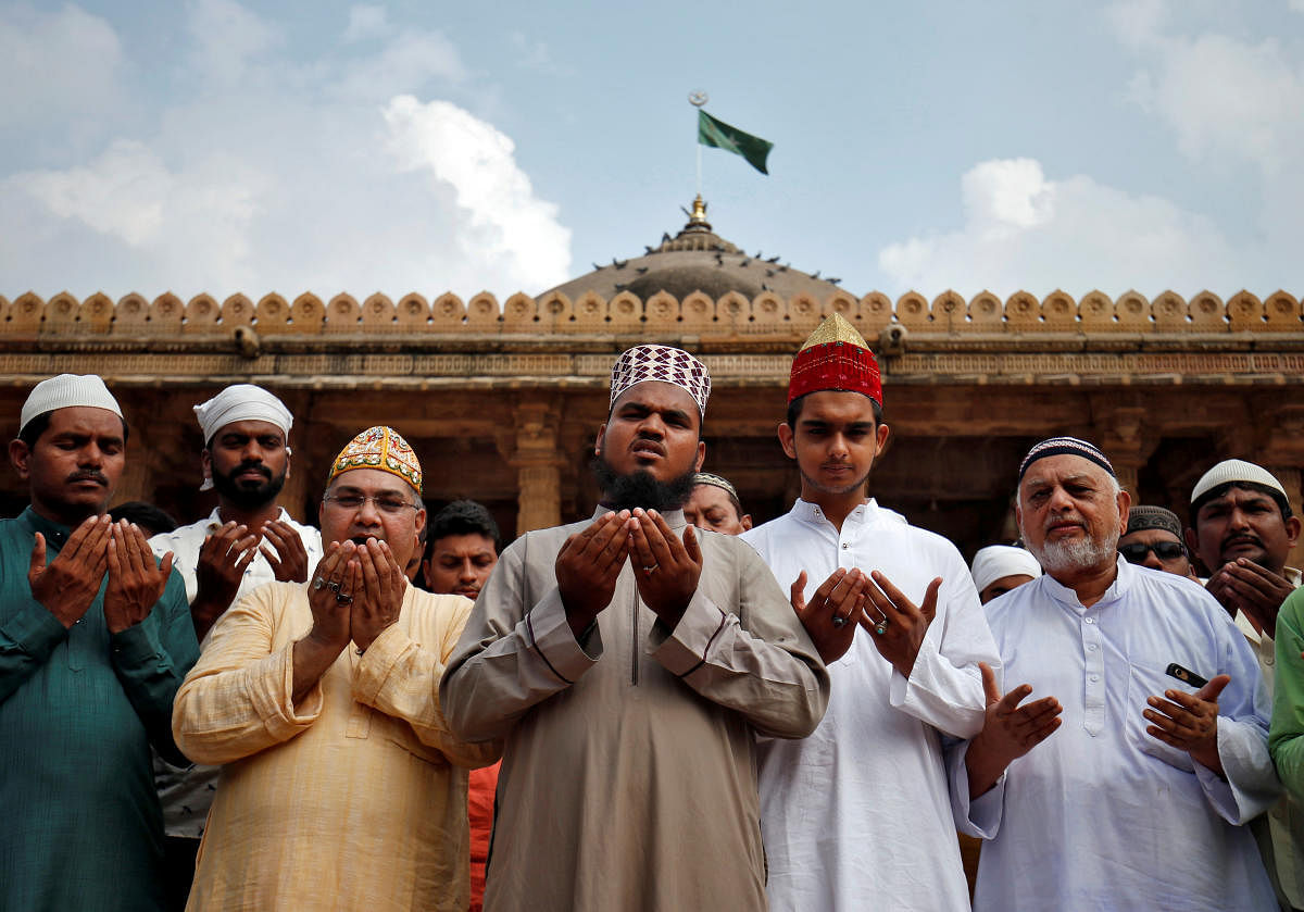 Muslims pray for peace ahead of verdict on a disputed religious site in Ayodhya, inside a mosque premises in Ahmedabad, India, November 8, 2019. (REUTERS)