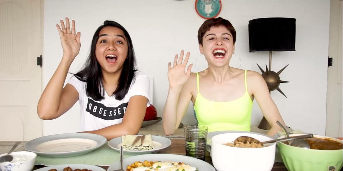 YouTubers Prajakta Kholi and Scherezade Shroff doing a mukbang challenge.