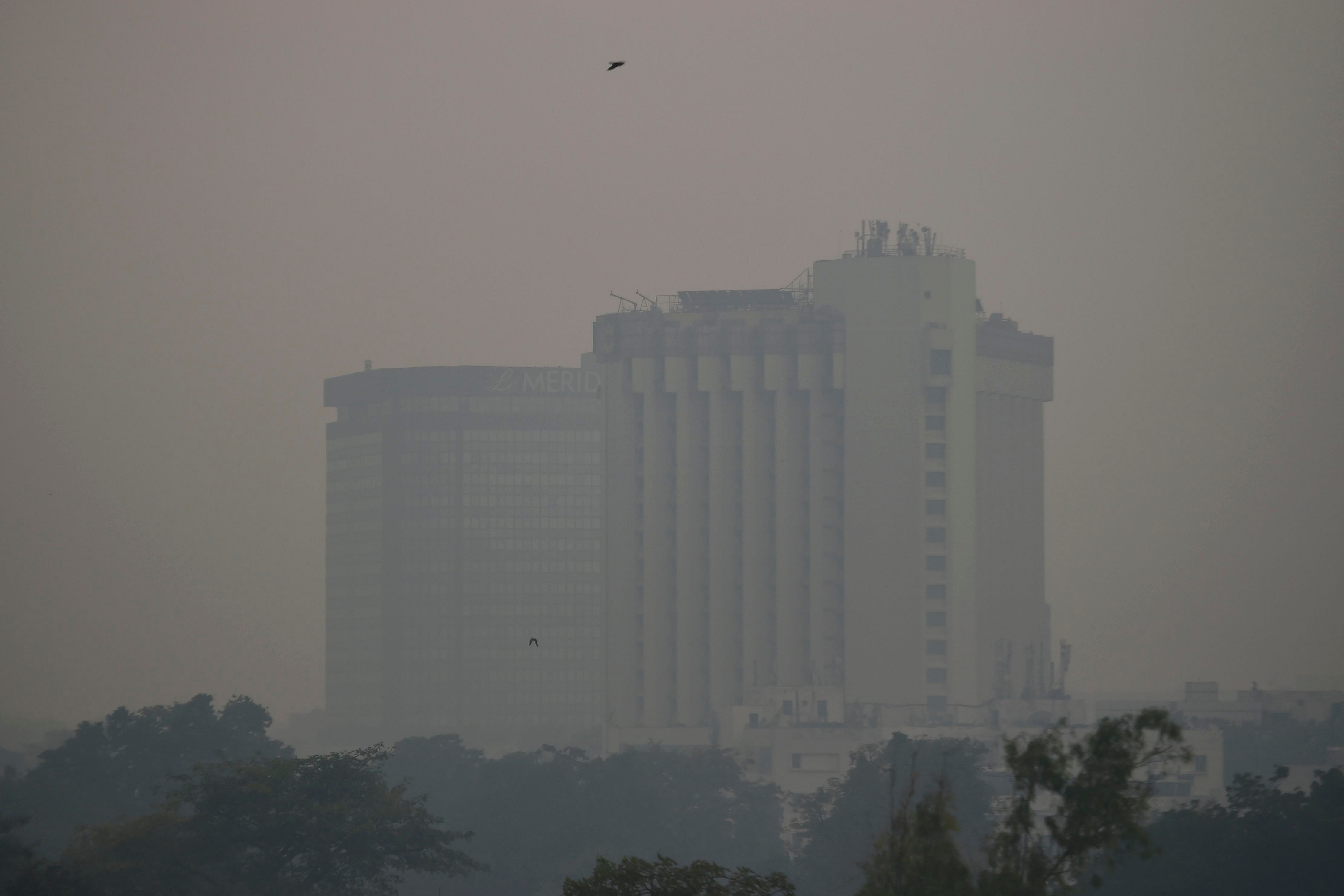 Buildings are seen covered in thick smog in New Delhi. (AFP Photo)