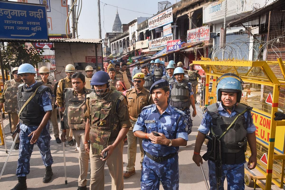 Police and RAF personnel patrol ahead of Ayodhya verdict. (PTI Photo)
