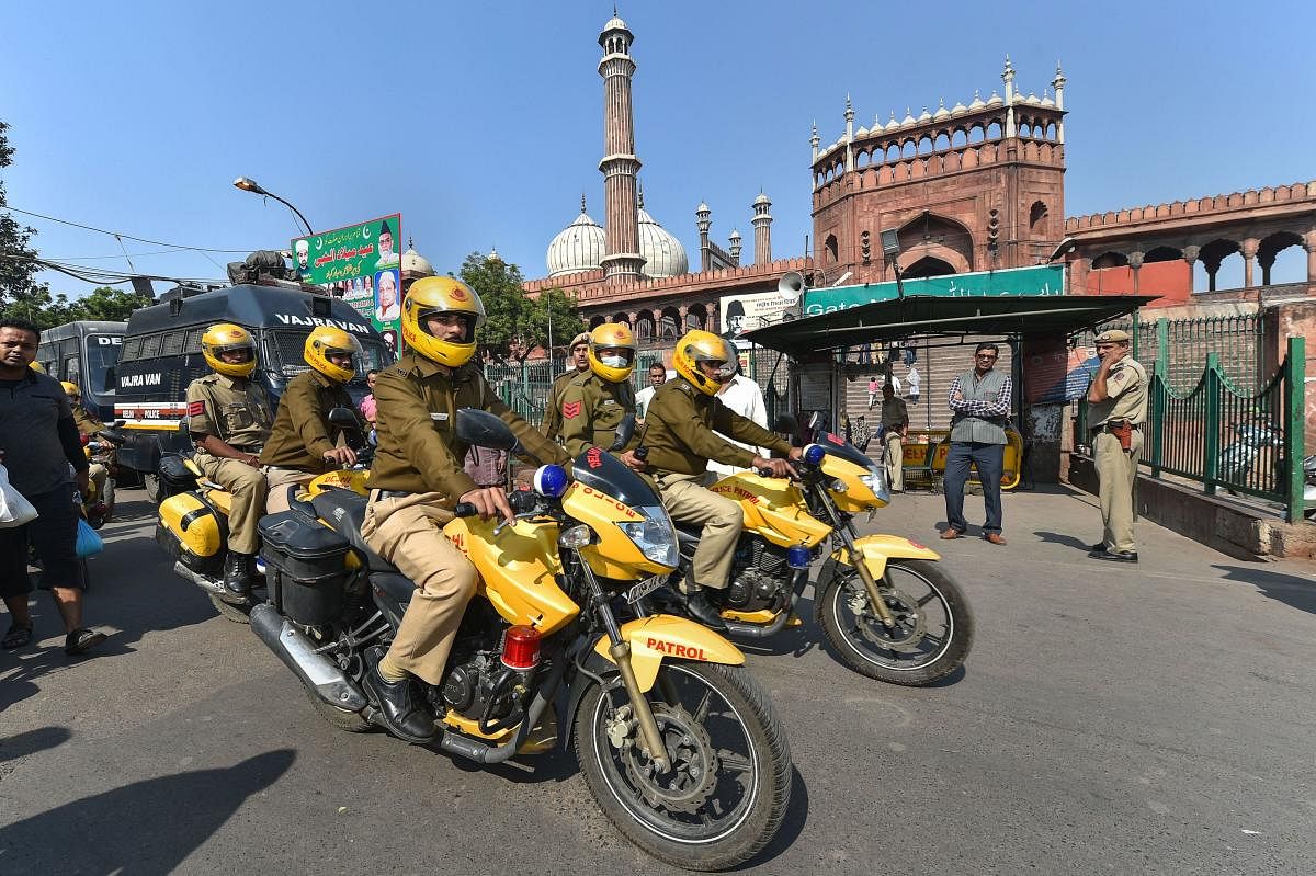  Police personnel patrol near the Jama Masjid as security has been beefed up in the view of the Ayodhya case verdict (PTI Photo)
