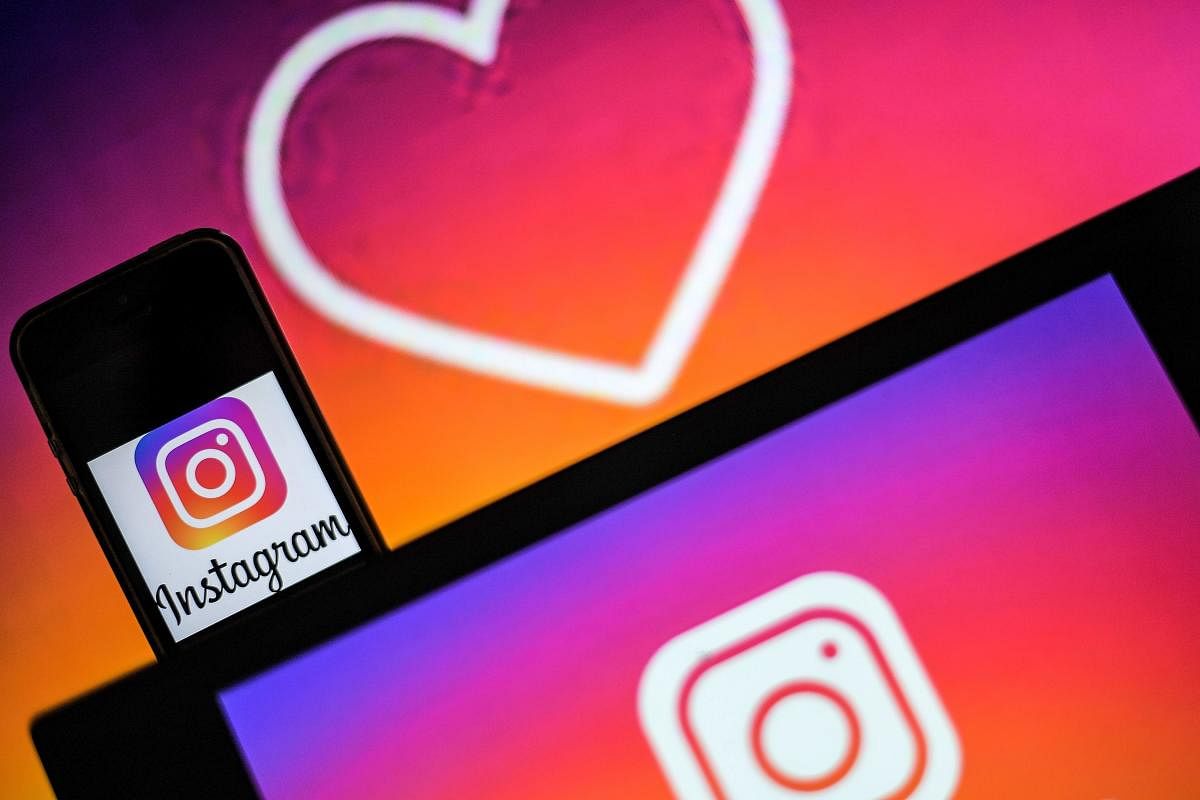 Logos of US social network Instagram.(Photo by LOIC VENANCE / AFP)