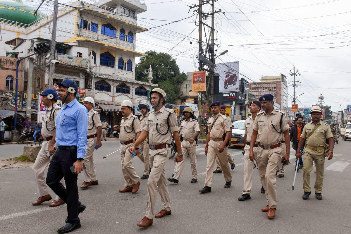 Police personnel patrol in a sensitive area as security has been tightened in the view of the Ayodhya case verdict, in Ranchi, Saturday, Nov. 9, 2019. (PTI Photo) 