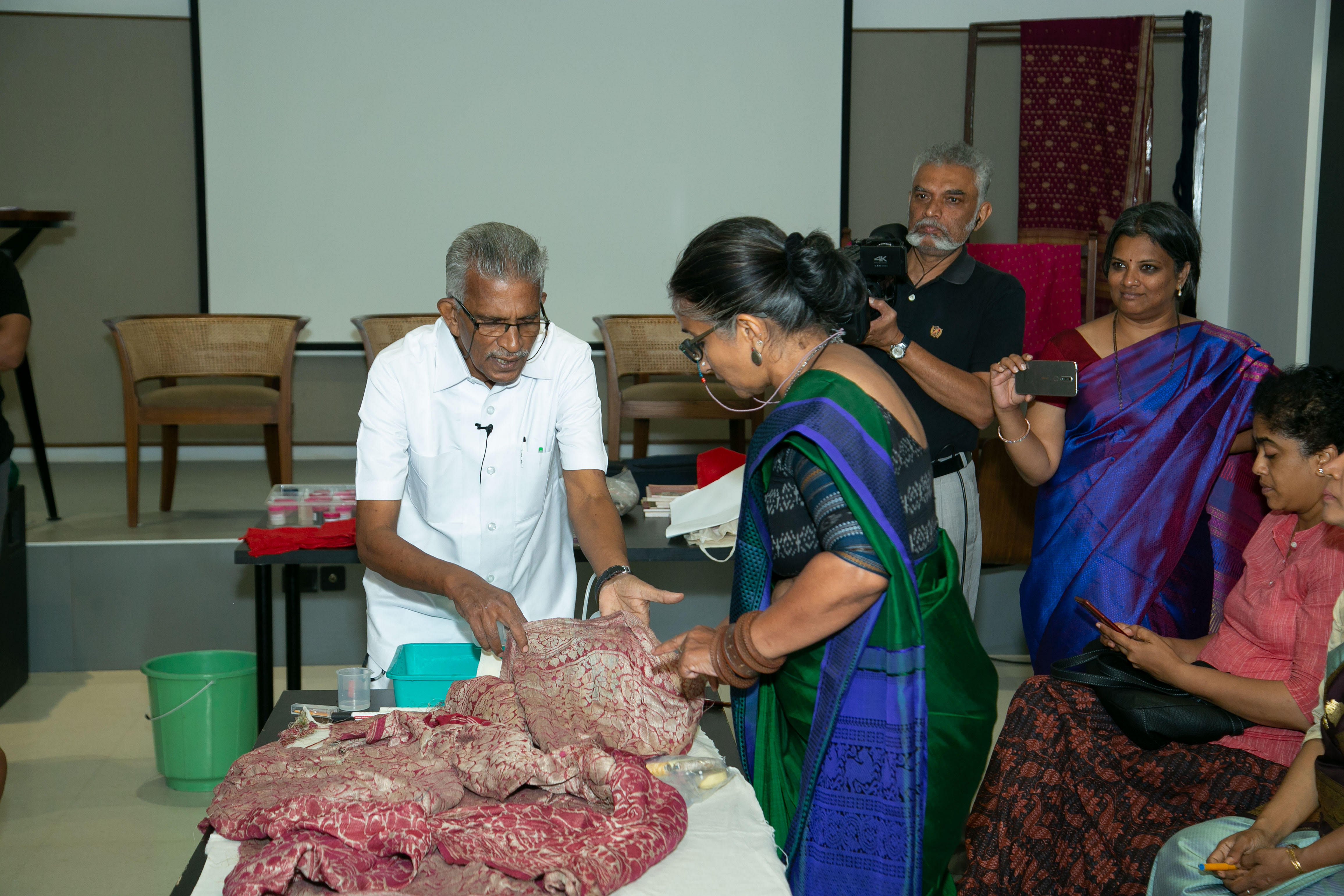 Dr Jeyraj (in white) shared tips on how to conserve handlooms at ‘A Textile Conservation Workshop’.
