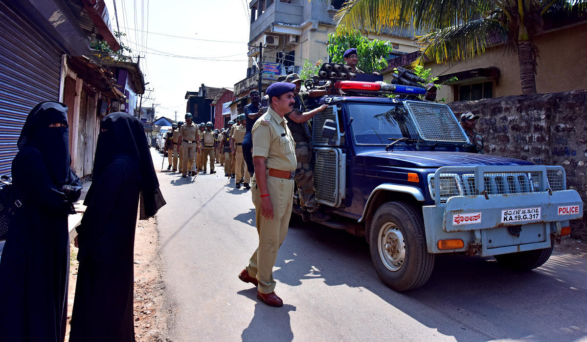 Commissioner of Police Dr P S Harsha takes part in area domination in a sensitive area in Mangaluru Commissionerate jurisdiction on Saturday.