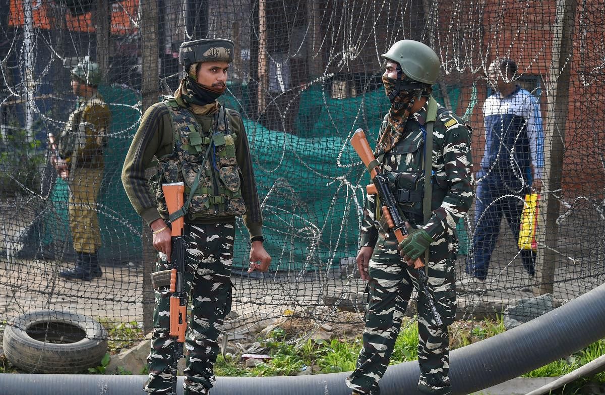 Security personnel in Srinagar.(PTI Photo)