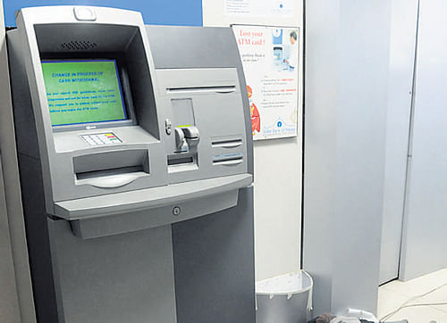 All new ATMs to be installed by commercial banks from July 2014 onwards would provide audible instructions and Braille keypads to customers, RBI said today. DH photo