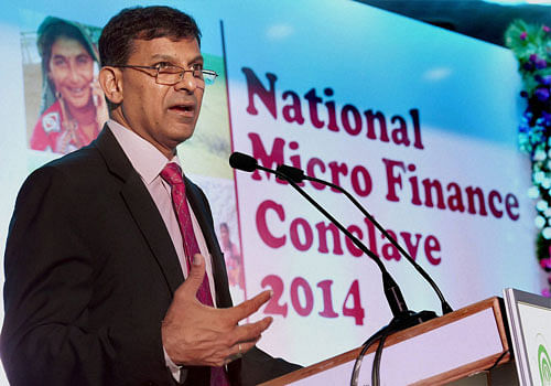 RBI Governor Raghuram Rajan speaks during the National Micro Finance Conclave 2014 at NABARD in Mumbai on Thursday. PTI Photo