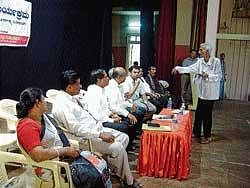 A senior citizen explaining his grievance at the Janaspandana meet at Town Hall in Mangalore on Saturday.