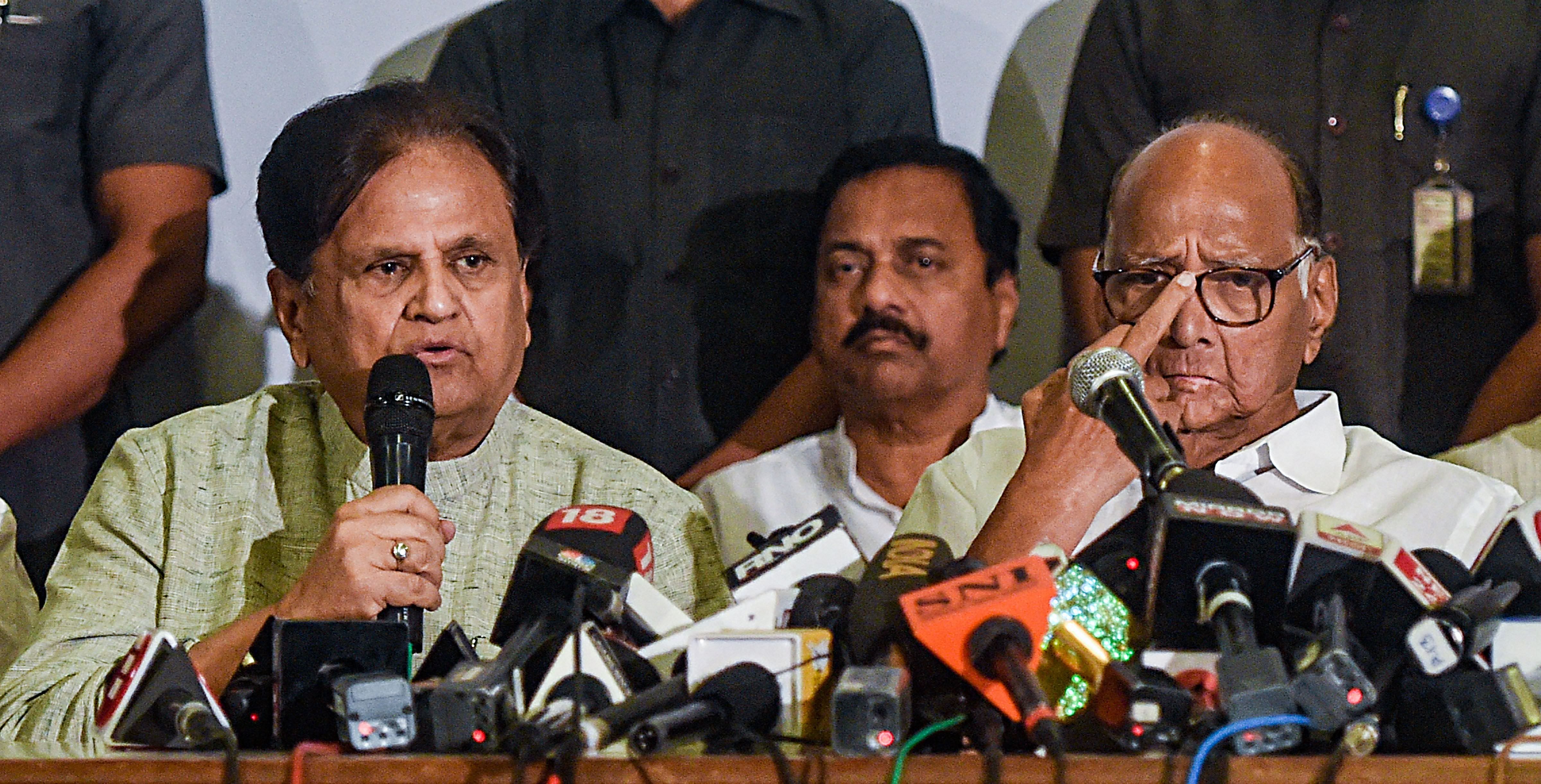 Nationalist Congress Party (NCP) Chief Sharad Pawar and Congress leader Ahmed Patel during a joint press conference, in Mumbai. (PTI Photo)