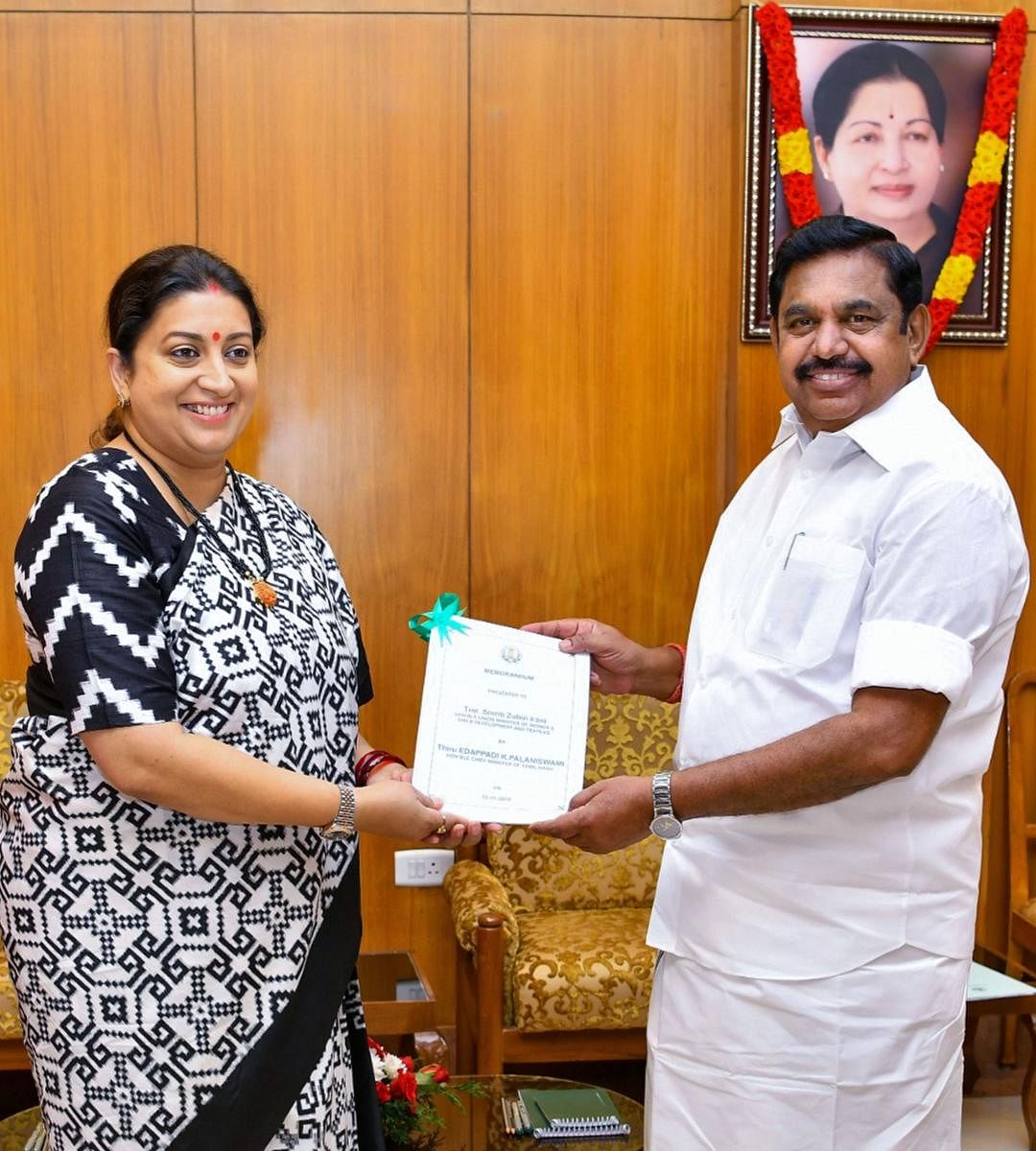 Tamil Nadu Chief Minister K Palaniswami presents a memorandum to Union Minister of Women and Child development and Textiles Smriti Irani, at the Secretariat in Chennai, Tuesday, Nov. 12, 2019. (PTI Photo)