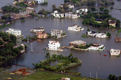Balasore: An aerial view of an area flooded by heavy rains in the aftermath of Cyclone Phailin in Balasore on Monday. PTI