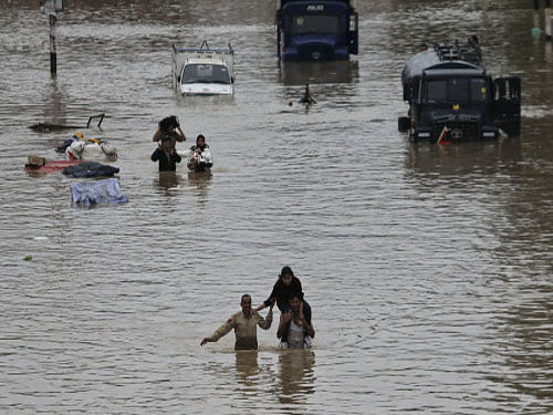 Flood fury today maintained its grip over Jammu and Kashmir, leaving 138 dead and many marooned as the swirling waters inundated the Army cantonment, Civil Secretariat and the High Court in Srinagar and snapped road and communication links. AP photo