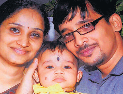 Poornima, Sriharsha and their son Shashank who are among the 10 people stranded in a Srinagar hotel.