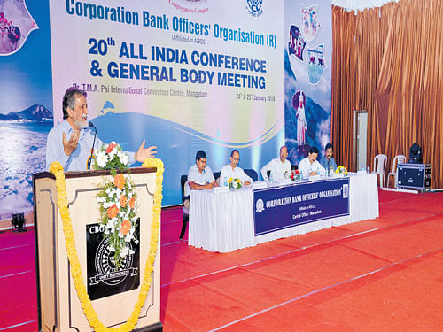 Kerala State Planning Board former Vice Chairman Prabhat Patnaik delivers the inaugural address at the 20th All India Conference of Corporation Bank Officers' Organisation in  Mangaluru on Sunday. DH photo