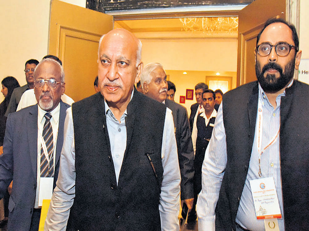Minister of State for External Affairs M J Akbar, MP Rajeev Chandrasekhar and others arrive to take part in the convention of the Global Organisation of the People of Indian Origin in Bengaluru on Thursday. DH photo