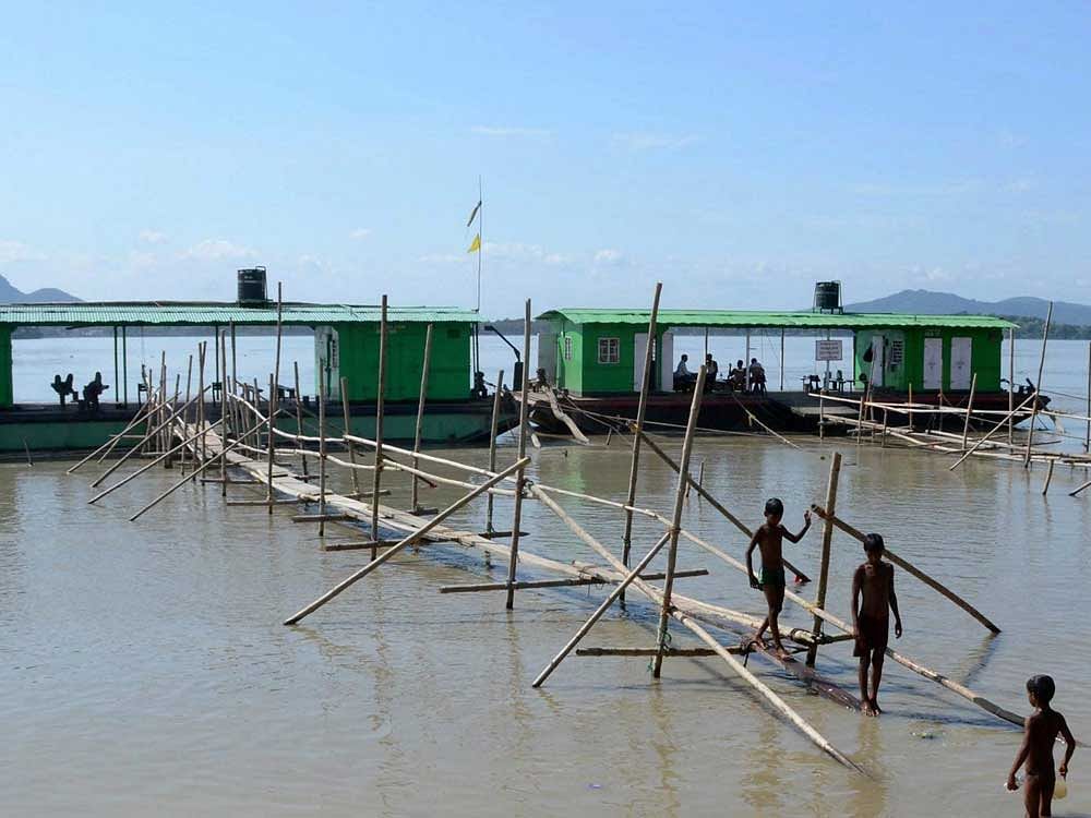 As many as 60 people have died in the Assam flood this year, with 8 of them from Guwahati. PTI file photo.