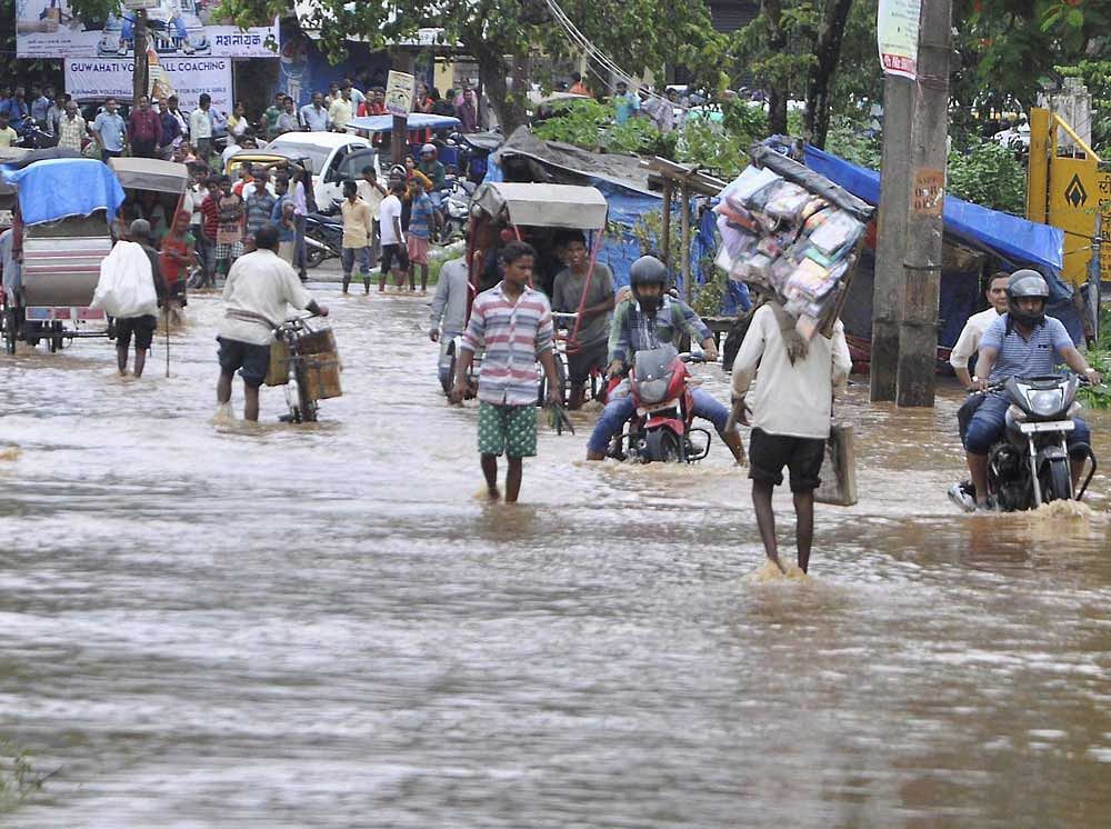 Gujarat, Rajasthan, Assam and parts of West Bengal were hit by widespread floods that have claimed several lives. PTI File photo