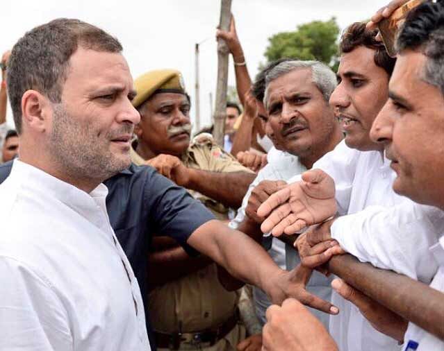 Rahul Gandhi, who is on one day visit to Rajasthan, toured flood-hit areas in Jalore district. Gandhi reached Sanchor village in Jalore by helicopter and toured the flood-hit areas by road.  Deccan Herald photo