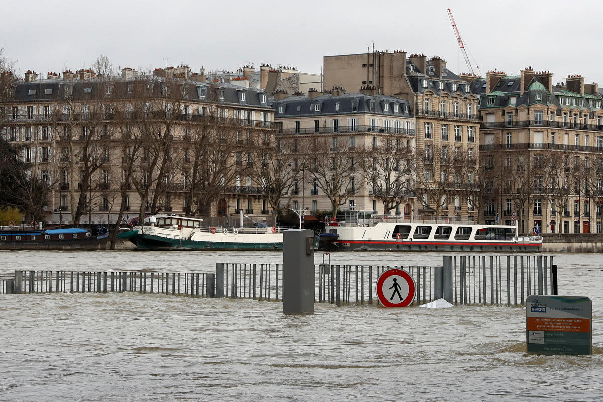 A view shows the flooded banks of the Seine River after days of almost non-stop rain caused flooding in the country in Paris, France, on Sunday. REUTERS