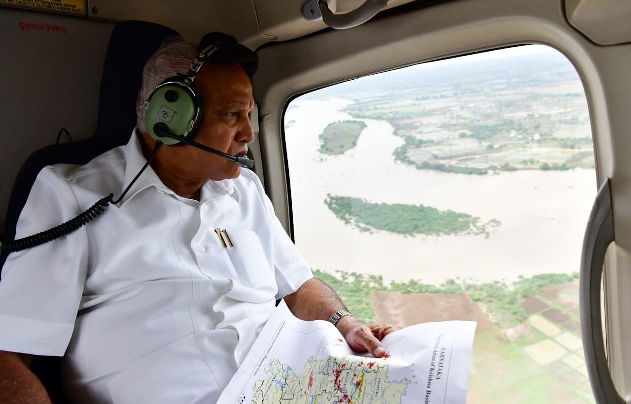 CM B S Yediyurappa takes an aerial survey in Raichur and Yadgiri.
