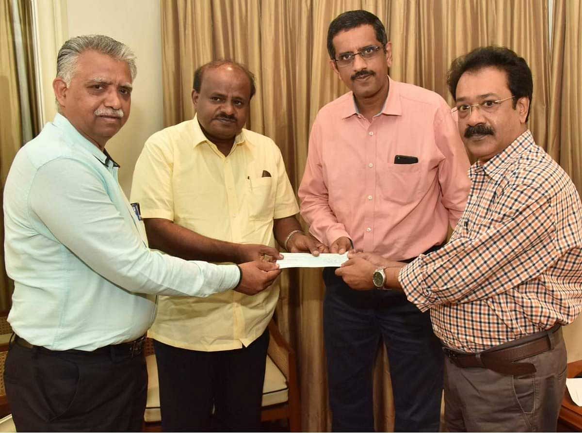 A cheque for Rs 46.46 lakh was on Wednesday handed over to Chief Minister H D Kumaraswamy towards the Chief Minister’s Calamity Relief Fund on behalf of the Deccan Herald and Prajavani Relief Trust. DH photo