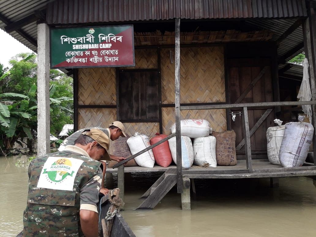 Personnel of the rhino protection force in the flooded Kaziranga National Park in Assam on Saturday. Photo credit: Assam forest department. 