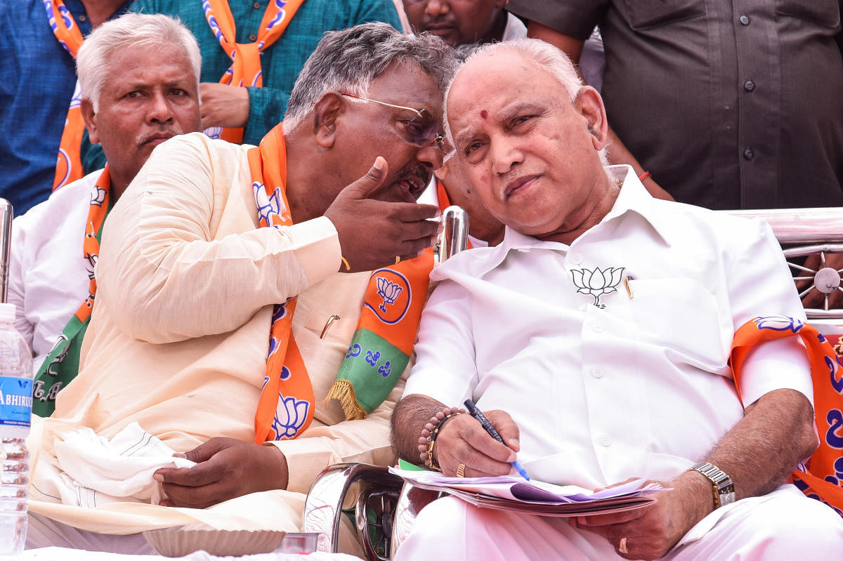 BJP State President B S Yeddyurappa and BJP Candidate Subhash Guttedar at BJP Public Meeting at Aland in Kalaburagi District on Monday. - Photo/ Prashanth HG